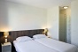 Das Schlafzimmer des Ferienhauses fr 10 Personen in Nieuwvliet Bad und Holland