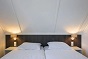 Das Schlafzimmer des Ferienhauses fr 16 Personen in Nieuwvliet Bad