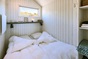 Das Schlafzimmer des Strandhauses fr 4 Personen in Den Haag
