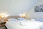 Das Schlafzimmer des Gruppenhauses fr 14 Personen in Cadzand Bad und Holland