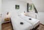 Das Schlafzimmer des Gruppenhauses fr 12 Personen in Hoge Hexel und Holland