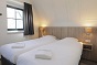Schlafzimmer von das Gruppenhaus fr 12 Personen in Volendam und Holland