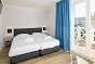 Das Schlafzimmer des Gruppenhauses fr 14 Personen in Hellevoetsluis und Holland