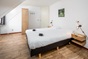 Das Schlafzimmer des Gruppenhauses fr 14 Personen in Hoge Hexel und Holland