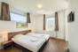Das Schlafzimmer des Gruppenhauses fr 16 Personen in Paasloo und Holland